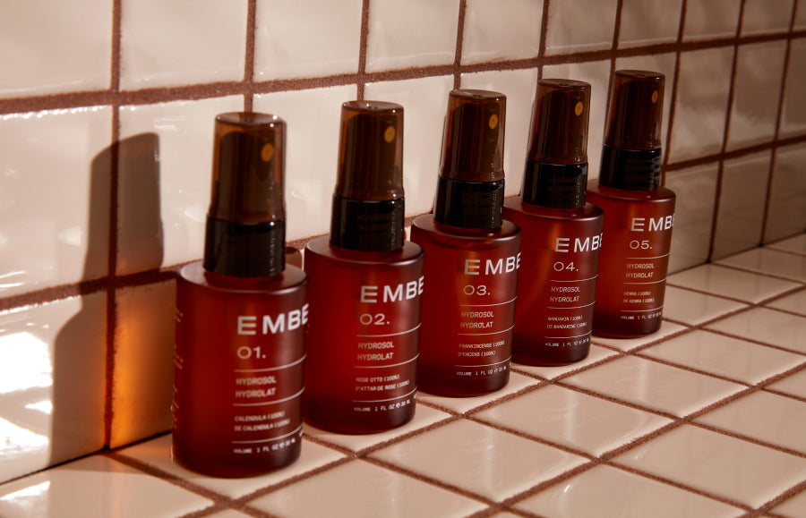 Five pure, 100% natural hydrating flower waters, each one a complement to the facial oil of the same number. Picture here, all five Ember hydrosols rest on a tiled surface.