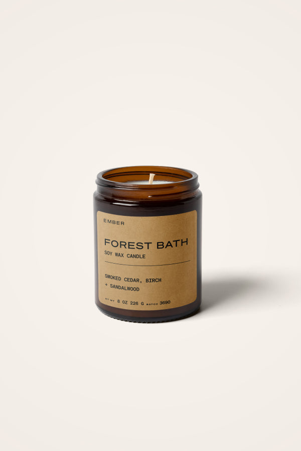 Our signature scent; handcrafted, naturally scented pure soy wax clean burning candle. Featuring notes of smoked cedar, birch and sandalwood. Amber glass vessel with black lid. Cotton wick. Hand poured in Toronto. All-natural essential oils. 